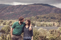 Jonathon and Shayla Batty, Coniston Old Man and Coniston Water in the background with beautiful quintessential Lake District views including a sailing boat 